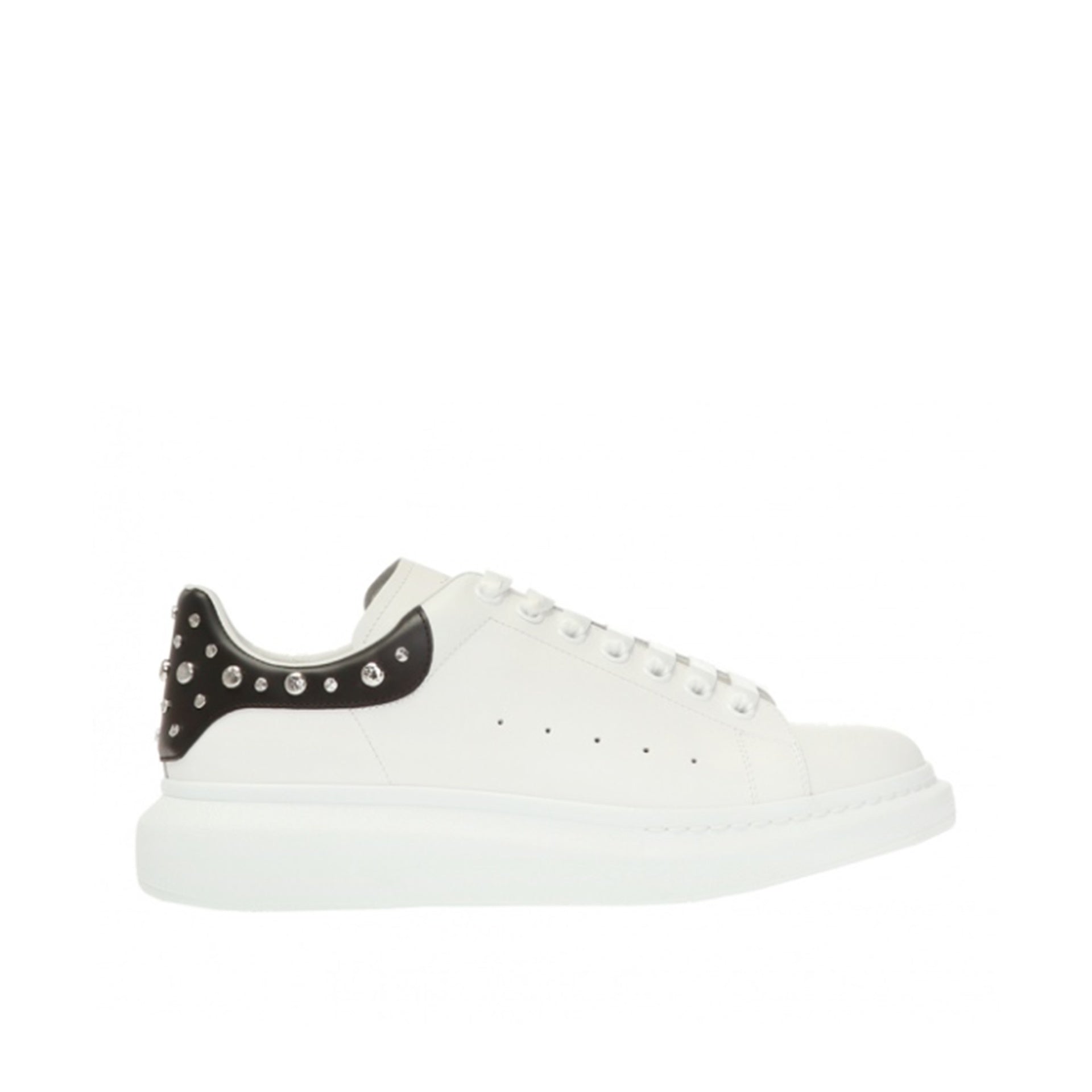 ALEXANDER MCQUEEN  Sneakers in Pelle Borchiata Bianche Alexander McQueen Uomo In Linea